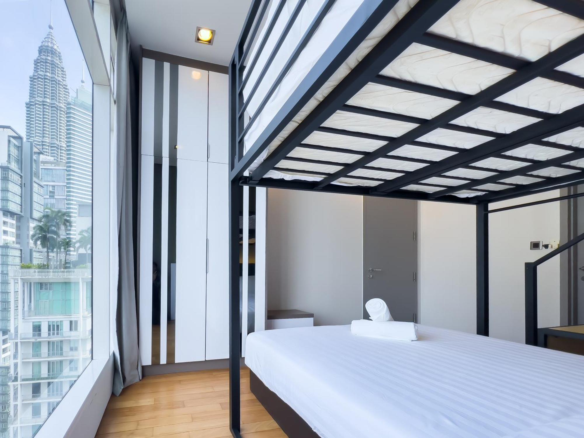Soho Suites Klcc By Guesthouse Куала-Лумпур Экстерьер фото
